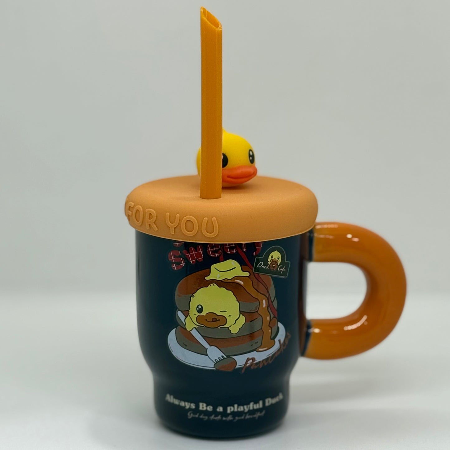Tasse mignonne avec paille
