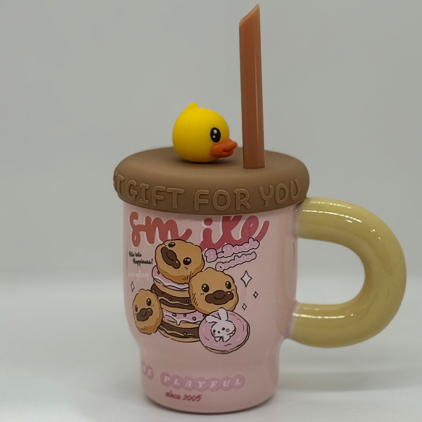 Tasse mignonne avec paille